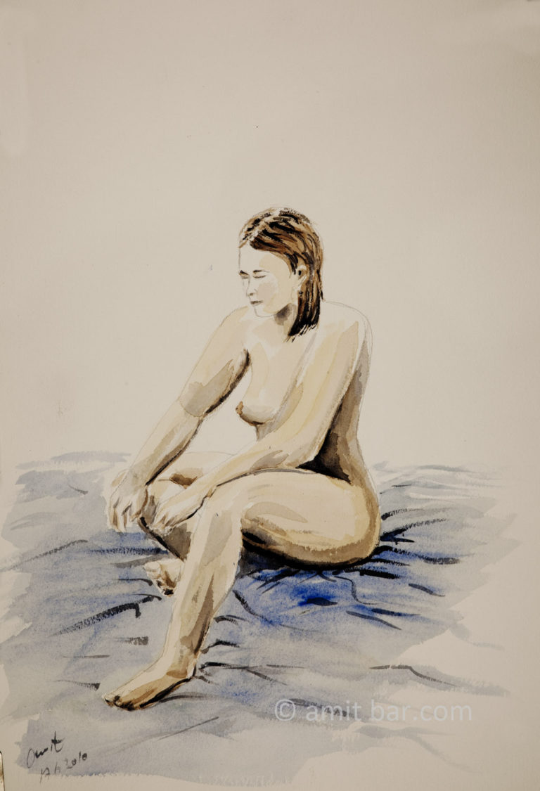A nude model sitting on the floor