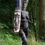 Body-painted model with African mask