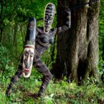 Body-painted model with African mask
