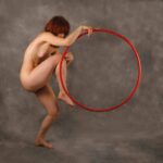 Ameria dancing with hula hoop II: Model Ameria is dancing with a hula hoop in my studio