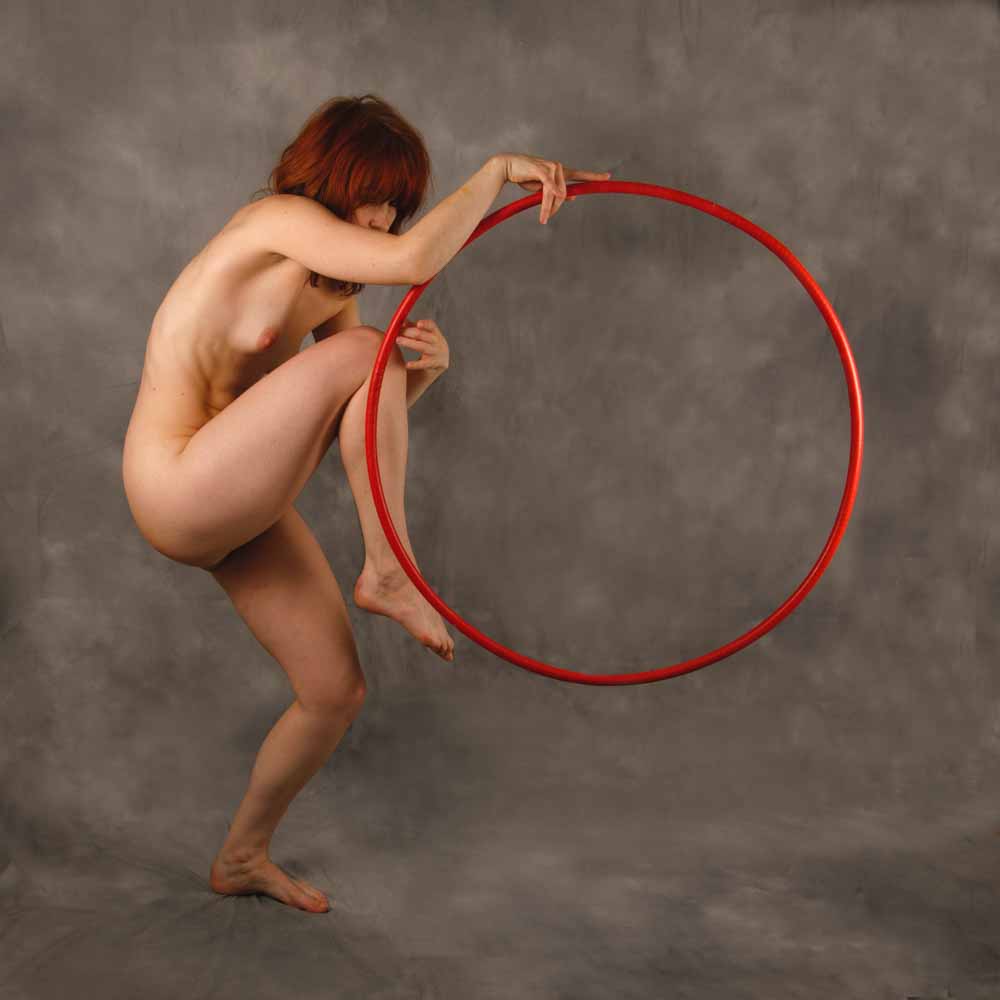 Ameria dancing with hula hoop II: 
Model Ameria is dancing with a hula hoop in my studio