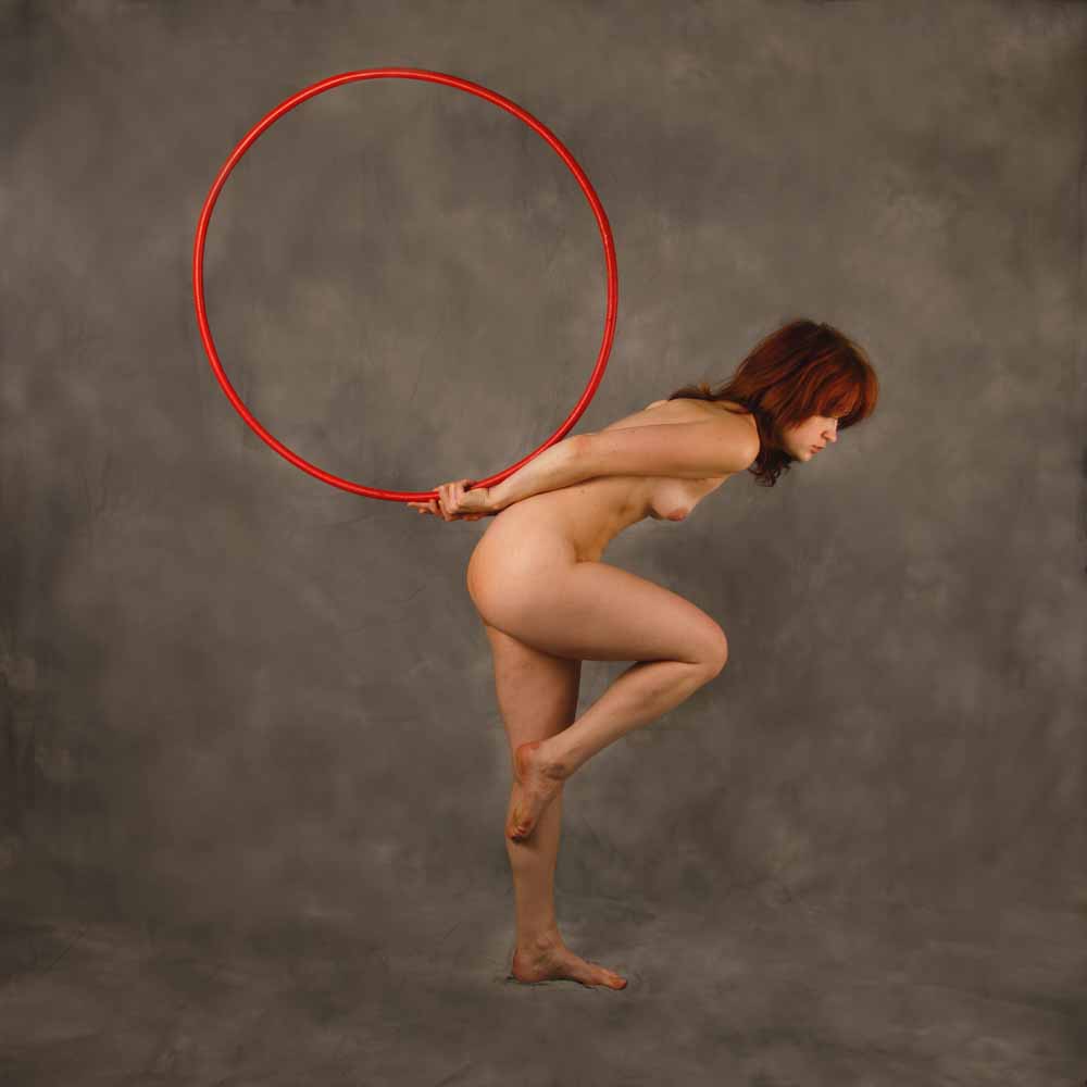 Ameria dancing with hula hoop III: 
Model Ameria is dancing with a hula hoop in my studio