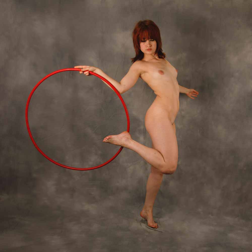 Ameria dancing with hula hoop VI: 
Model Ameria is dancing with a hula hoop in my studio