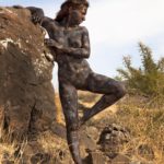 Basalt woman II: Body-painted model at the Golan Heights
