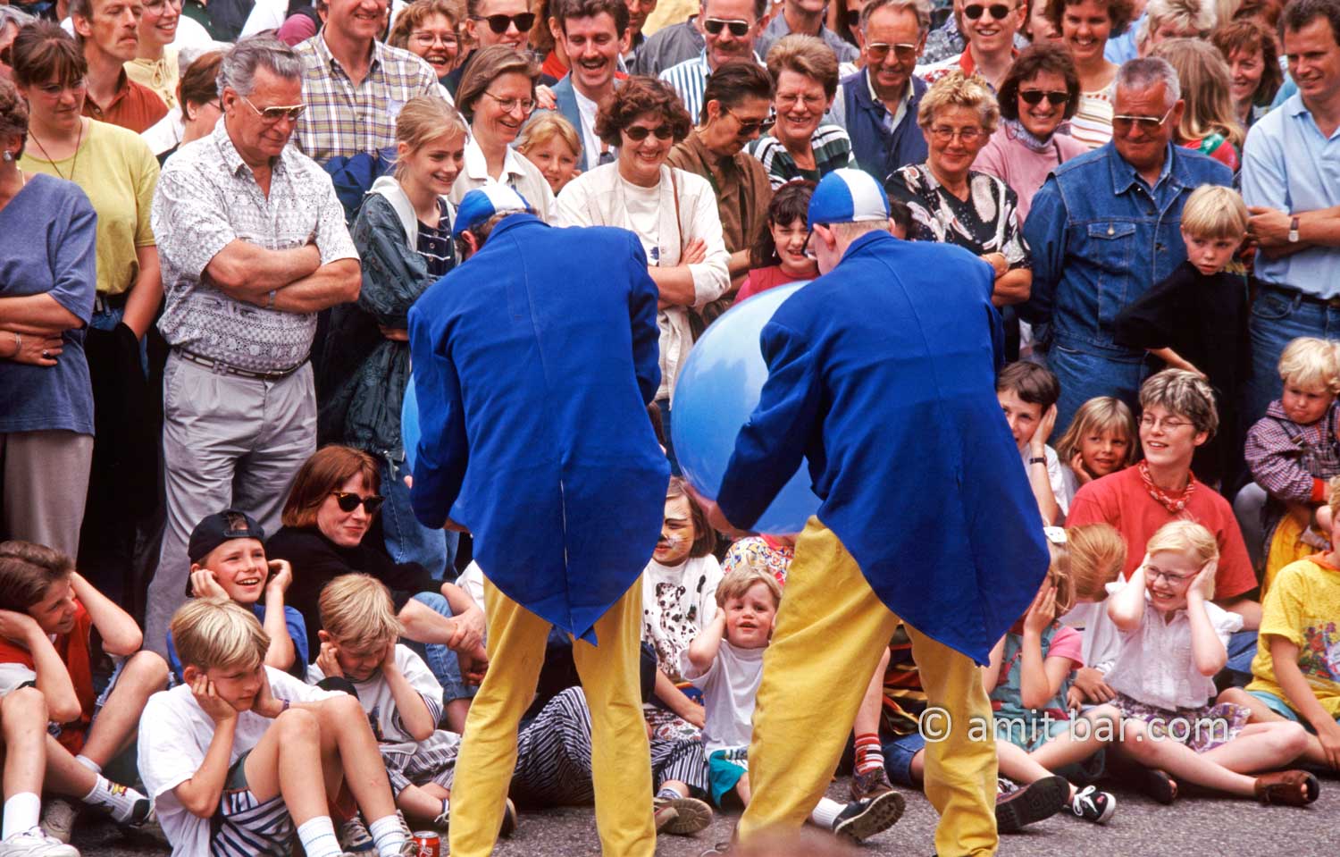 Be careful!: Two artist are blowing huge balloons on street theater show in Doetinchem, The Netherlands