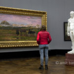 Berlin: Thinking. A visitor at the museum, Alte Nationalgalerie