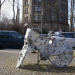 Berlin: Wrapped Bike are parked on street.