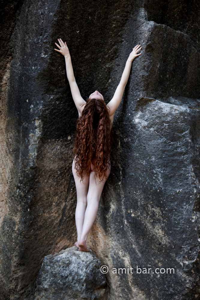Photo 3-I: Nude model at a black rock