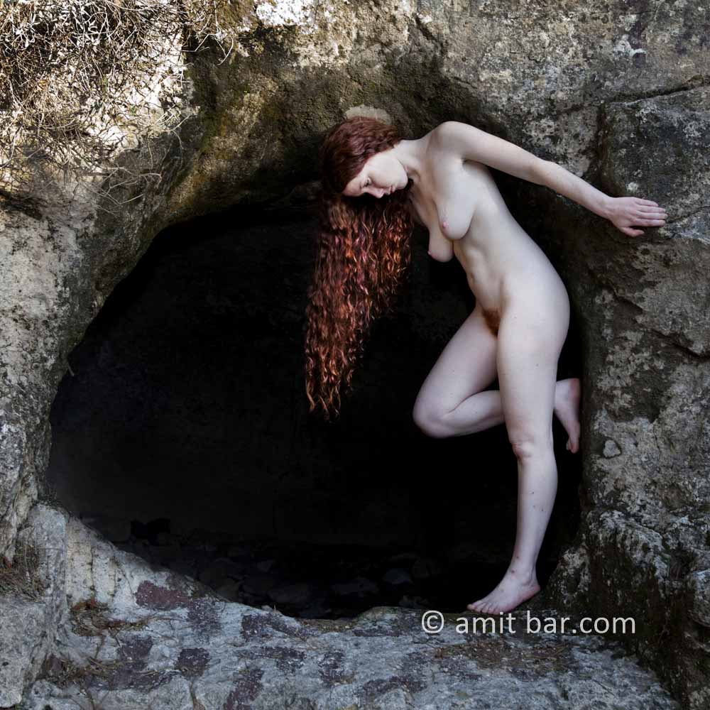 Photo 2: Nude model at a cave-opening