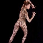 Black stripes I: Body-painted model in black stripes