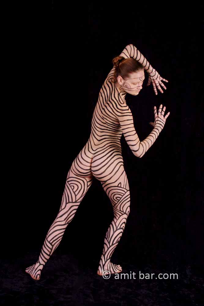 Black stripes I: Body-painted model in black stripes