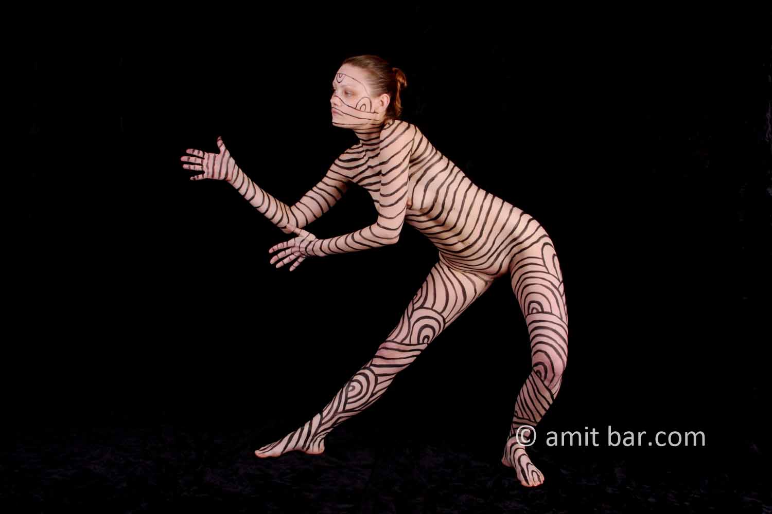 Black stripes II: Body-painted model in black stripes