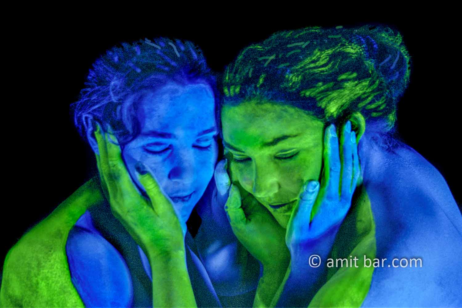 Blue and green I: Two body-painted models in UV blue and green