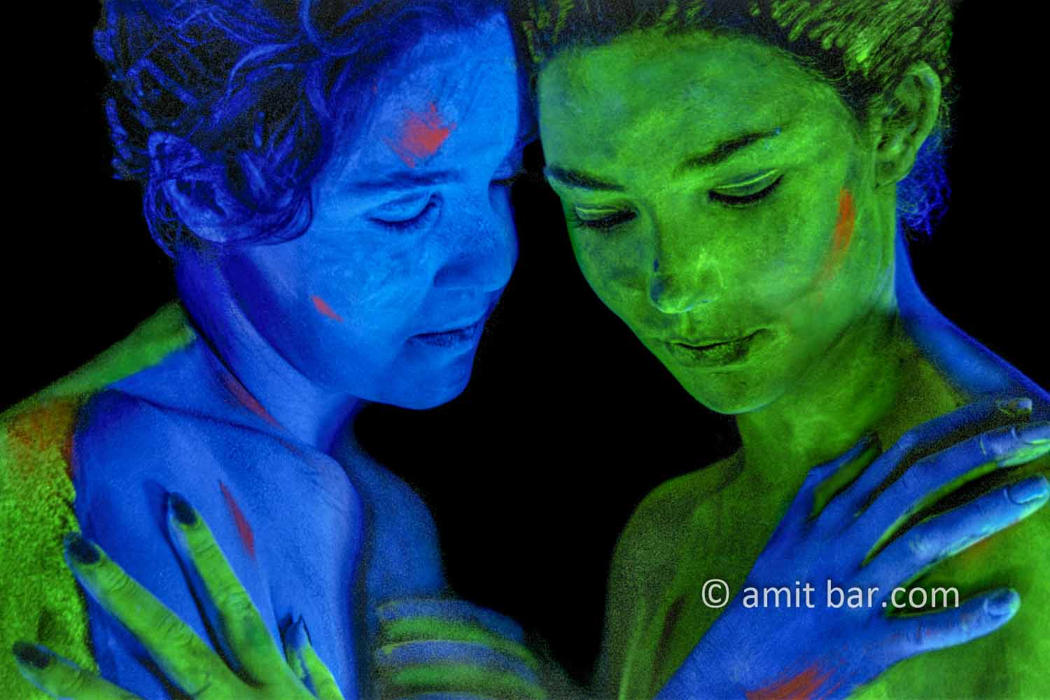Blue and green II: Two body-painted models in UV blue and green