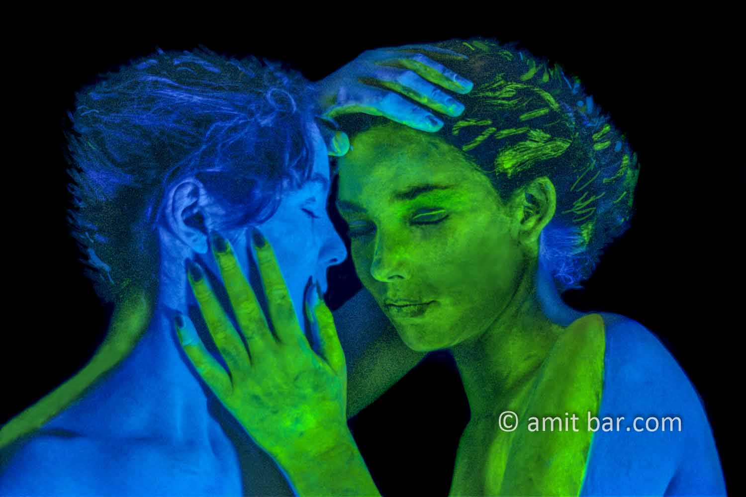 Blue and green III: Two body-painted models in UV blue and green