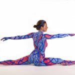 Blue and Red II: Body-painted yoga model in blue and red