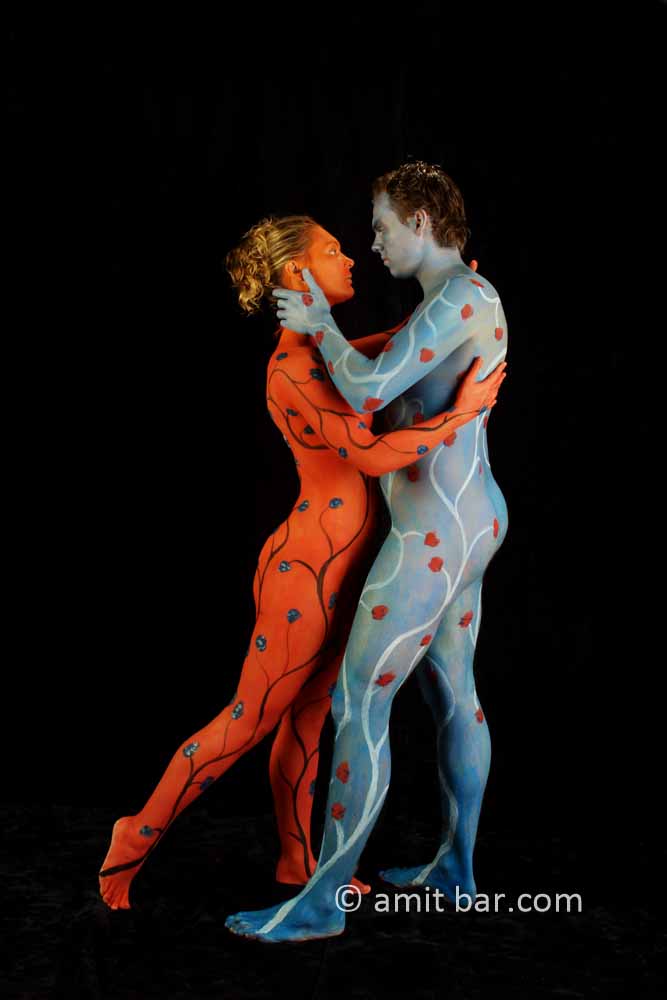 Blue and red tango I: Body painted dancers in blue and red