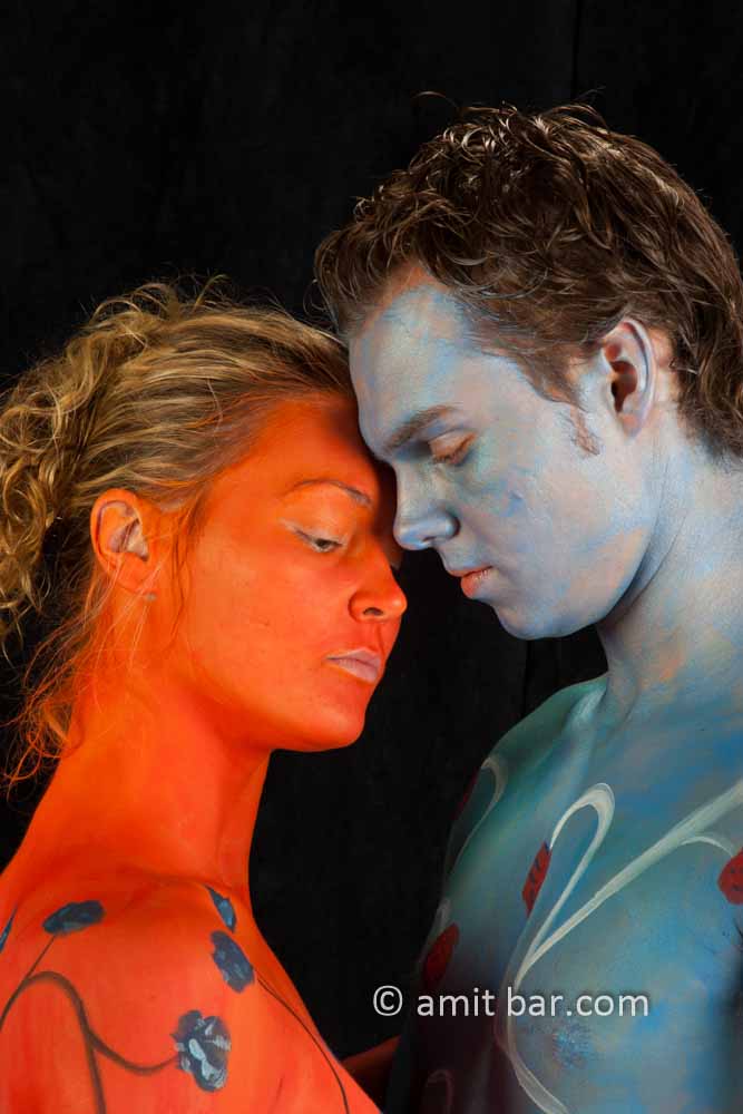 Blue and red tango III: Body painted dancers in blue and red