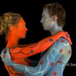 Blue and red tango IV: Body painted dancers in blue and red
