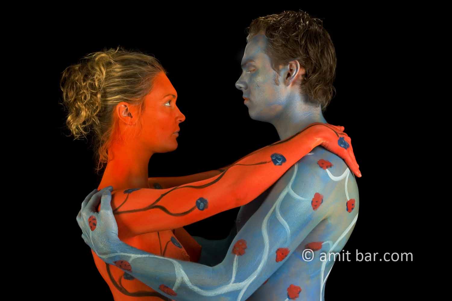 Blue and red tango IV: Body painted dancers in blue and red