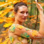 Body painted autumn leaves III: Autumn leaves painted on a model in the forest beside Doetinchem, The Netherlands