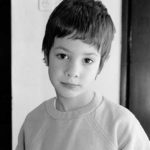 Brown eyes: A boy is looking to his father