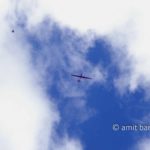 Clouds IV: White clouds and a glider