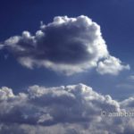 Clouds IX: black and white clouds in blue sky
