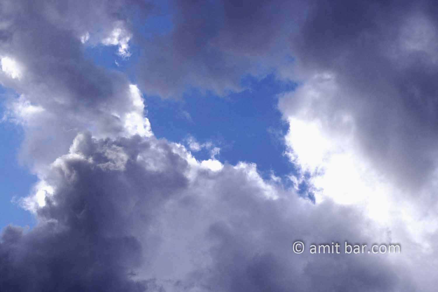 Clouds VIII: black and white clouds in blue sky