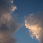 Clouds XIV: black and white clouds in blue sky