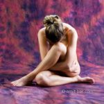 Compact: Nude model sits very copact in my studio