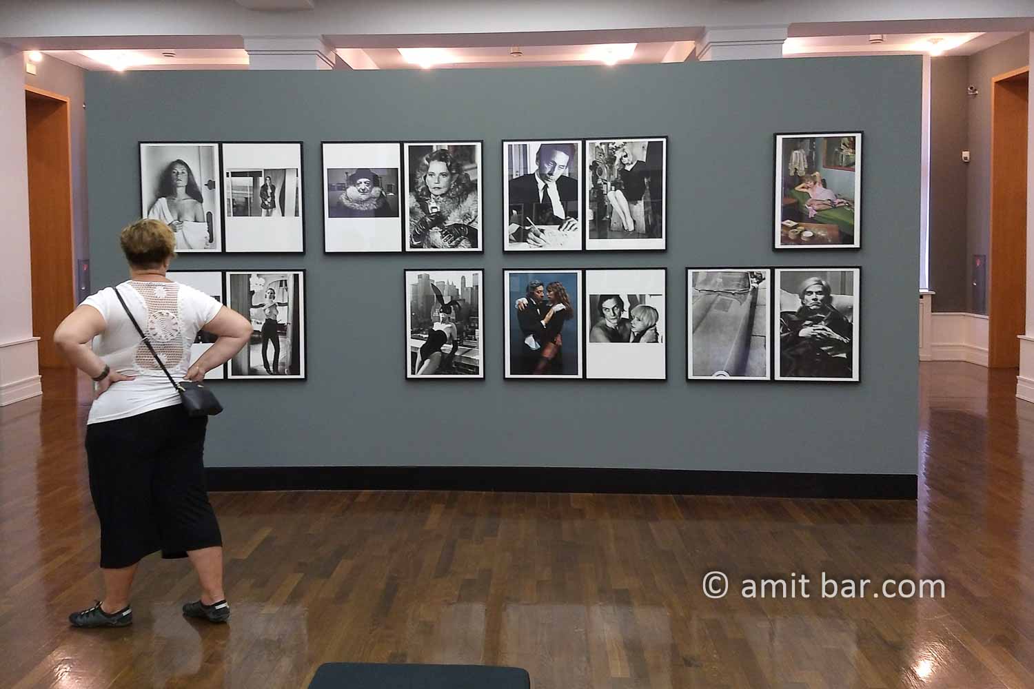 Confrontation: A visitor to Helmut Newton museum is observing his work