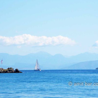 Corfu: Clouds, mountains and sailing boat