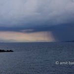 Corfu: Storm above Corfu: Rainstorm above Corfu city, Greece