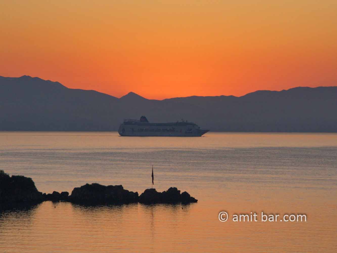 Corfu: Sunrise above Greece VI: Sunrise above Greece with a cruise ship