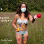 Body-painted model as Corona virus victim and fighter