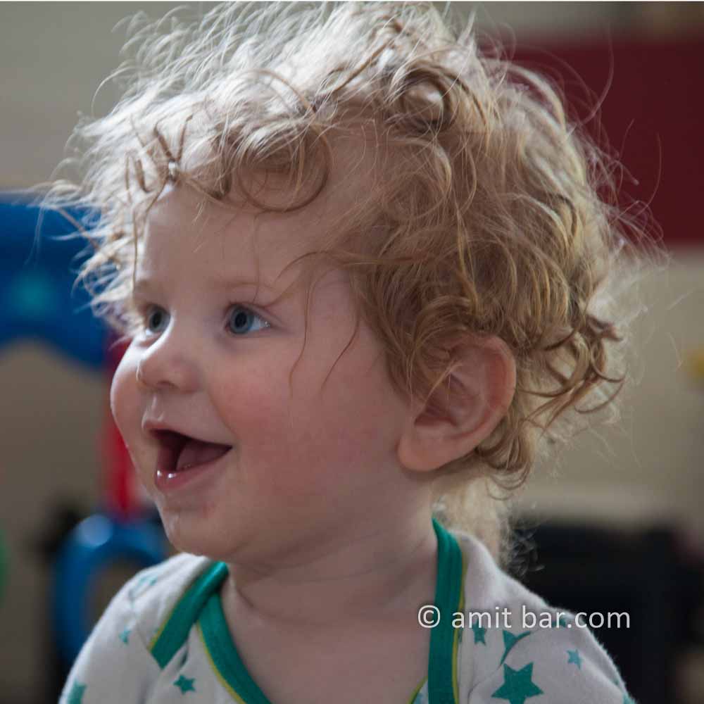 Curls III: Curly baby is laughing