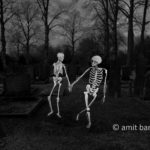 Dance Macabre I: Body-painted model as the angel of death is leading the next victim to his end