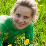 Dandelions III: Body-painted model in a field with dandelions