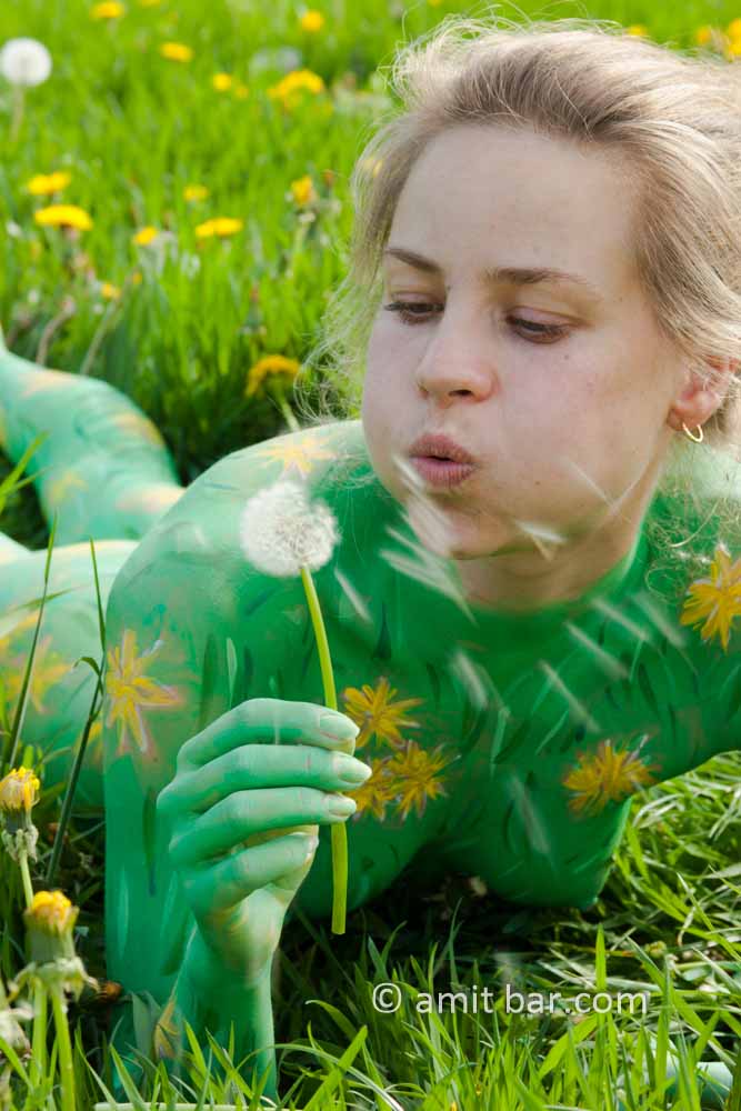 Dandelions IV: Body-painted model in a field with dandelions
