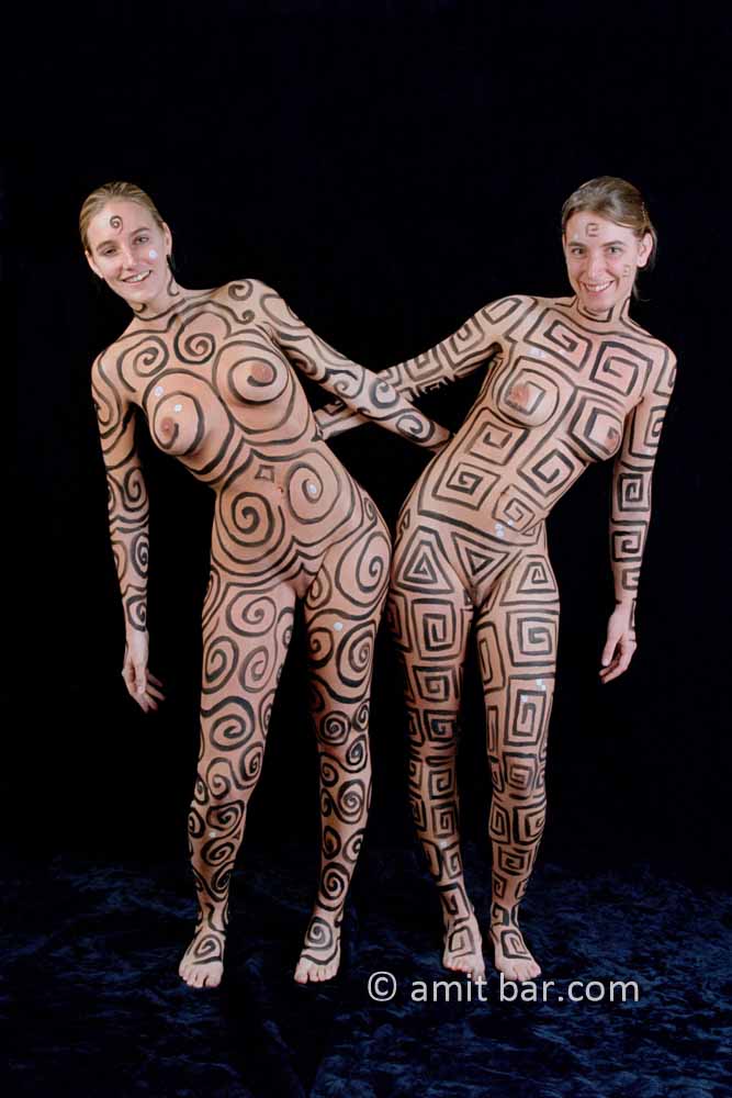 Different sisters II: Two body-painted sister-models