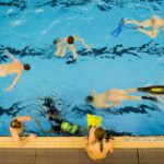 Divers: Nude divers at a swimmingpool