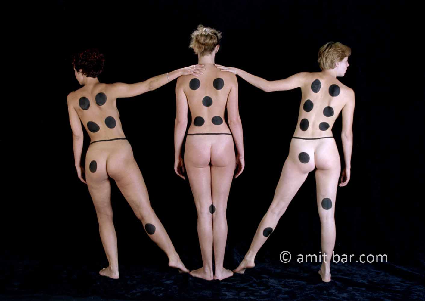 Dominos I: Three body-painted models as domino-blocks