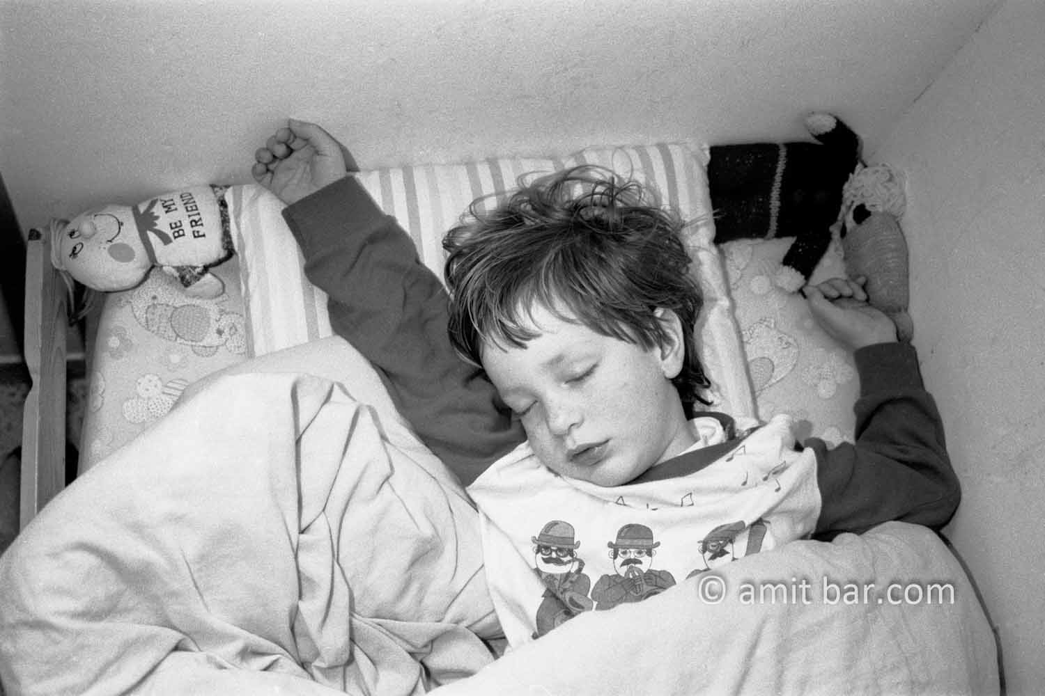 Dreaming II: A child is dreaming in his bed