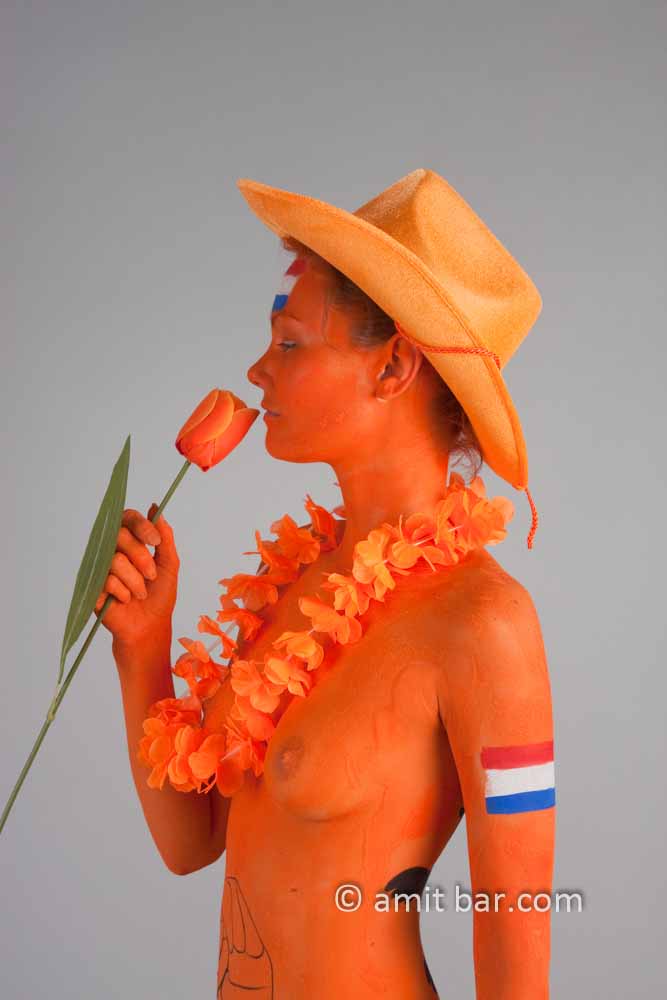 Dutch soccer IV: Body-painted model with orange tulip
