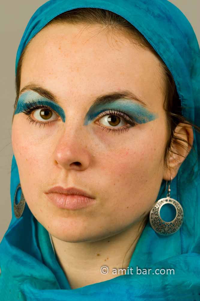 Eyes, hair and scarf V: A girl with a blue headscarf and makeup