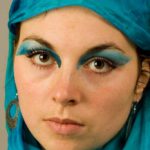 Eyes, hair and scarf VI: A girl with a blue headscarf and makeup