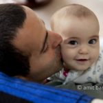 Father and daughter I: Father is kissing his daughter