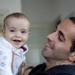 Father and daughter II: Father is lifting daughter