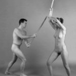Fighters I: Nude man and woman exercising martial arts